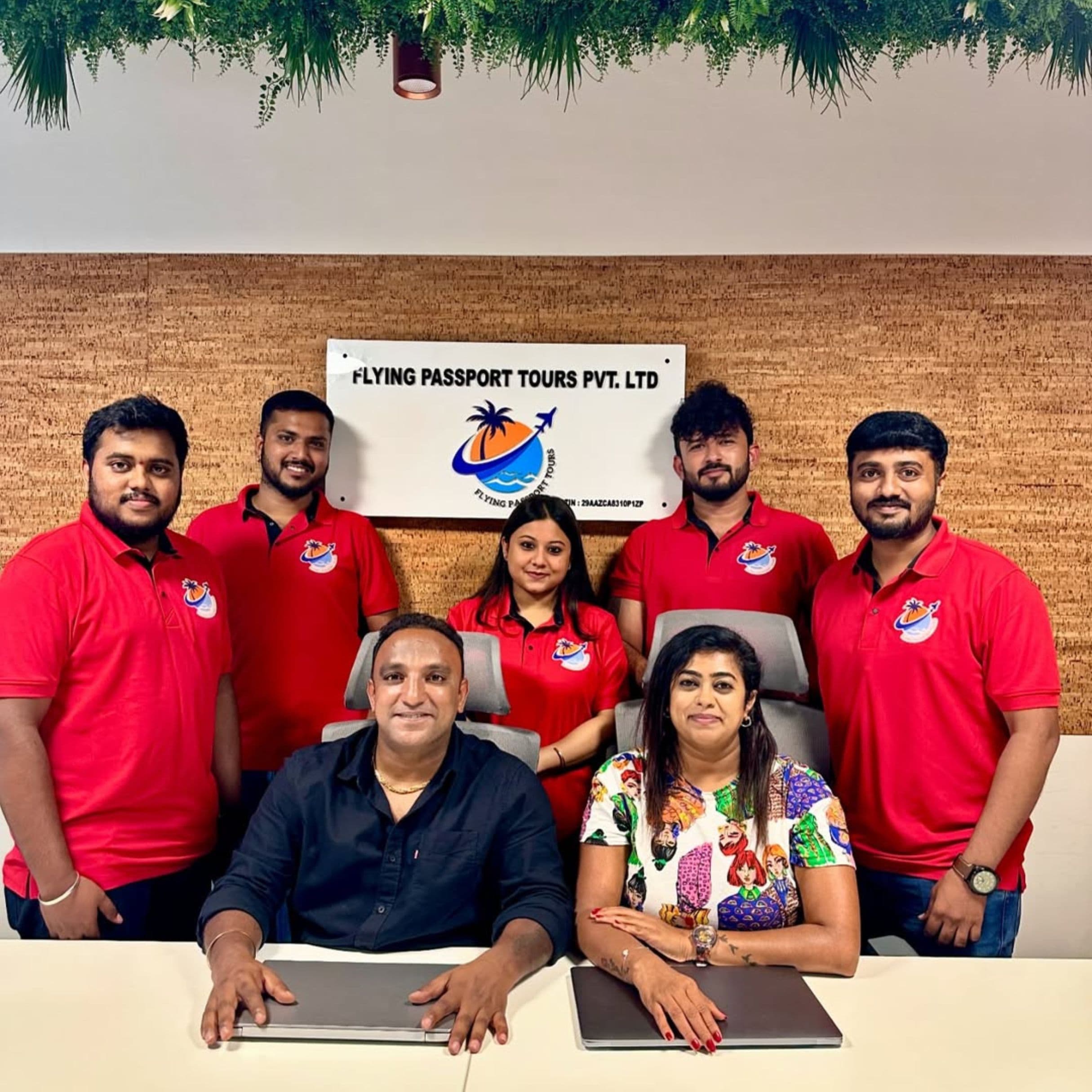 Flying Passport team in office